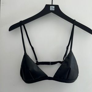 This black bra top is 100% polyester it’s super soft.